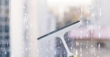 man-cleaning-window Glass cleaning